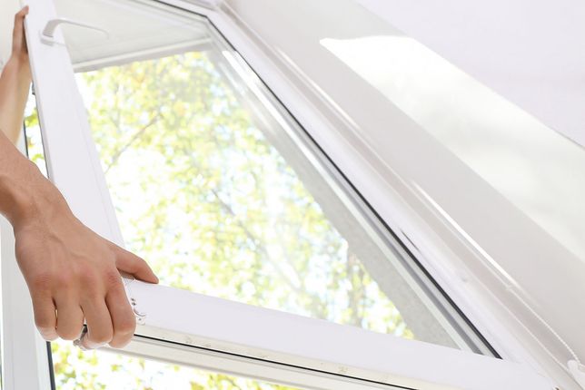 Insurance approved windows being installed